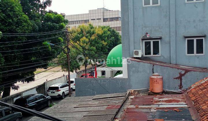 Rumah di tengah kota jakarta timur berikut dengan 20 kontrakan 2