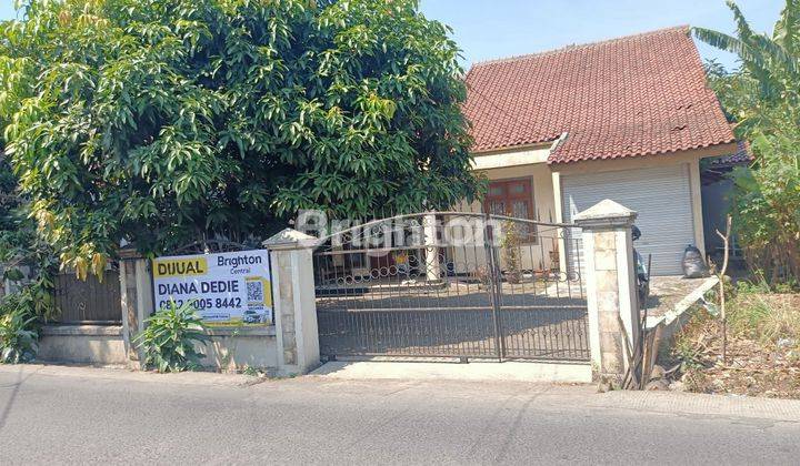 RUMAH STRATEGIS DIPINGGIR JALAN RAYA DGN HALAMAN YG LUAS 1