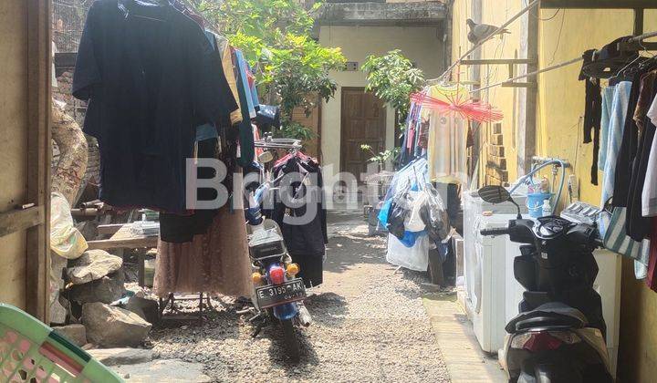 RUMAH INDUK DAN KAMAR KOST DI TEPI JALAN PADAT DAN RAMAI, DEKAT LINGKUNGAN PABRIK DAN IINDUSTRI 1