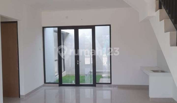 ruang keluarga rumah brand new cluster plus