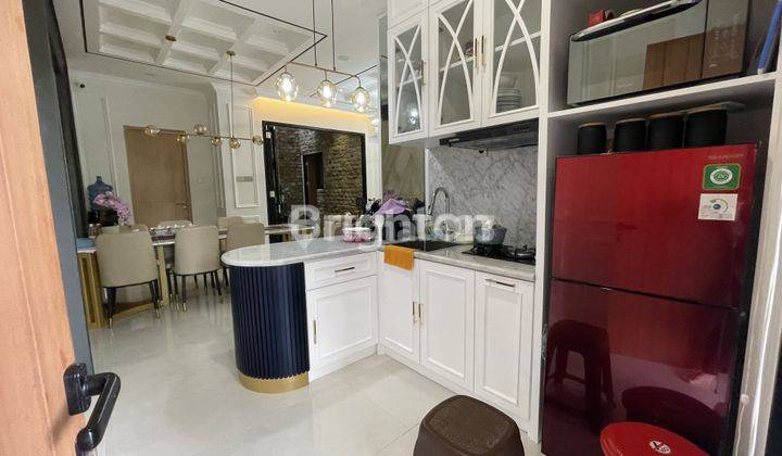 di kan rumah baru mewah dan modern Full furnished di basuki rahmat 2