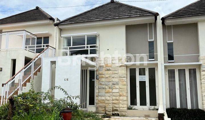 Rumah modern 1 lt tanpa furnished di perum.elit kota Batu 2