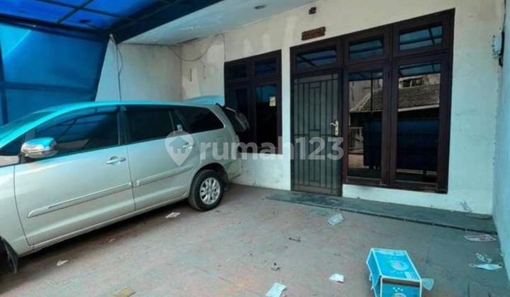 Rumah Di Kelapa Hibrida Menghadap Utara