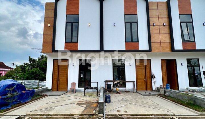 RUMAH TOWNHOUSE BARU CANTIK DI DALAM KOMPLEK PERUMAHAN ONE GATE SYSTEM DI DAERAH KENTEN 1