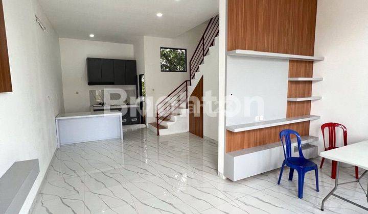 RUMAH TOWNHOUSE BARU CANTIK DI DALAM KOMPLEK PERUMAHAN ONE GATE SYSTEM DI DAERAH KENTEN 2