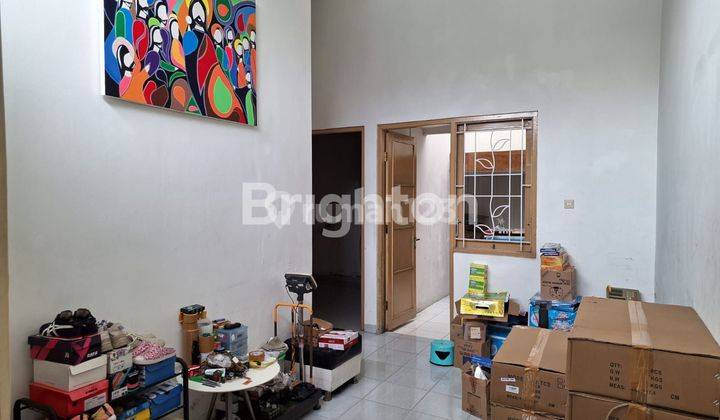 RUMAH MINIMALIS DI PERUMAHAN CLUSTER COLOMADU 2