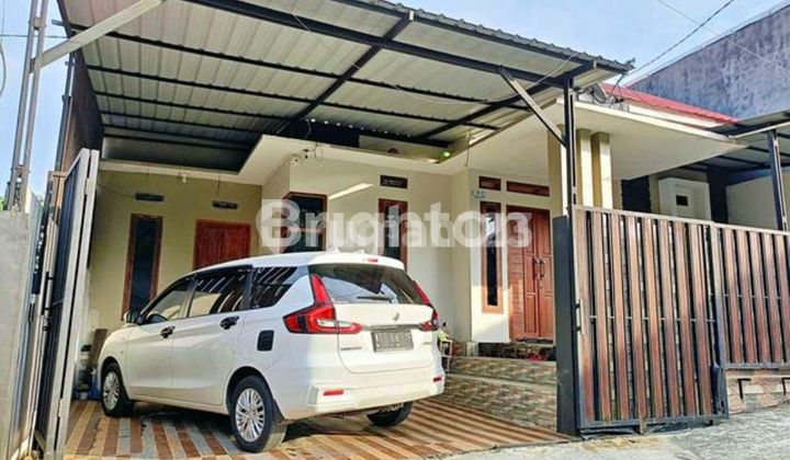 RUMAH CANTIK SIAP HUNI DEKAT AKSES TOLL