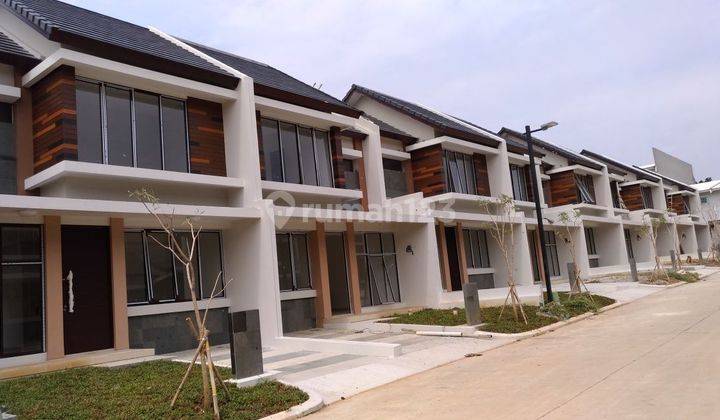 Rumah Cluster Cosmo Estate lippo cikarang Lokasinya strategis dengan style bangunan yang modern minimalis. 1