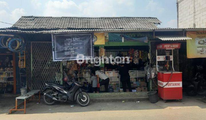 RUMAH DAN TEMPAT USAHA PINGGIR JALAN RAYA LOKASI BAGUS 2