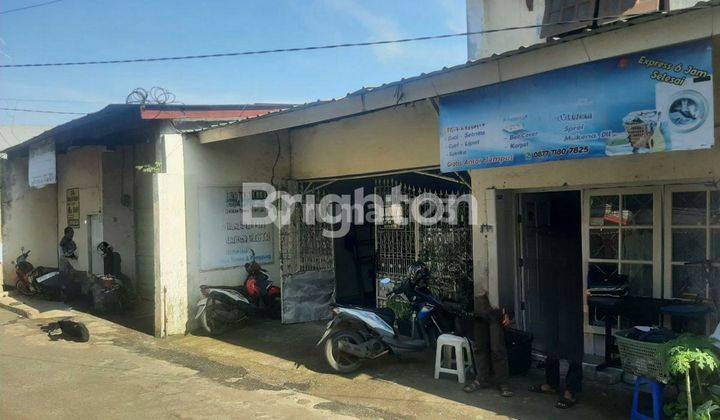 RUMAH DAN GUDANG LAYAK HUNI DIPINGGIR JALAN DEPOK TENGAH 1