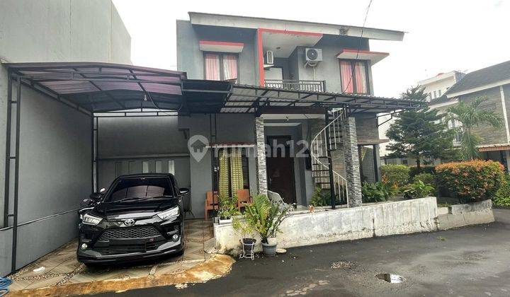 Rumah rapih, bagus halaman asri siap huni 1