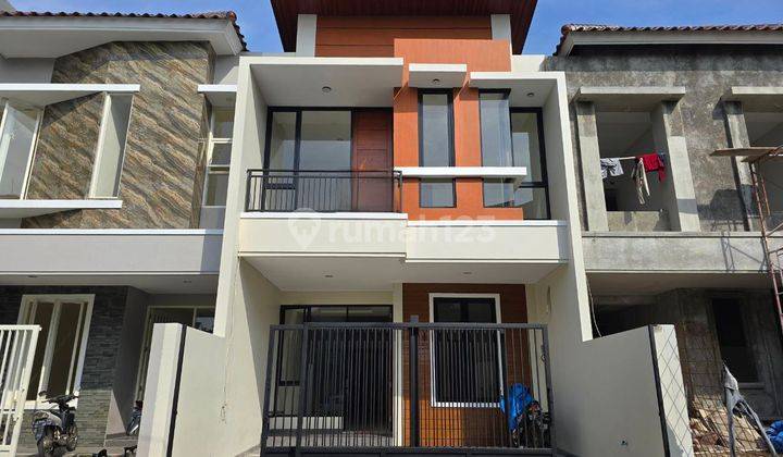 Rumah Pantai Mentari NEW MINIMALIS ROW 3 MOBIL carport 2 1