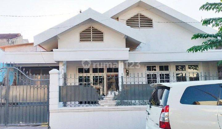 Rumah Dharmahusada Indah Utara STRATEGIS, GARASI 2 MOBIL + CARPORT  1