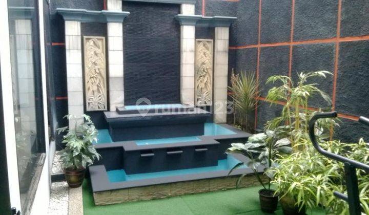 RUMAH MEWAH ADA TAMAN DEPAN BELAKANG DI MARGAHAYU 1