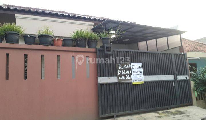 rumah lama dekat pertokoan 1