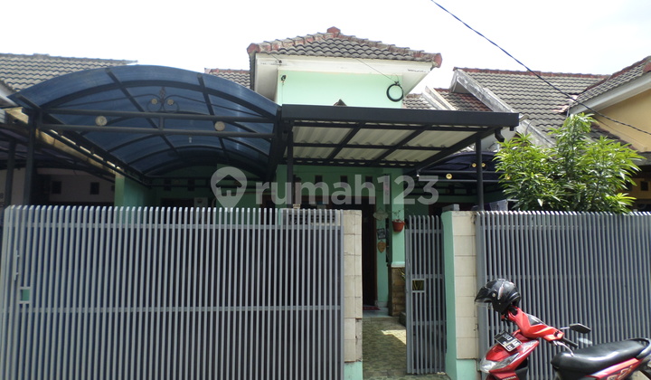 RUMAH NYAMAN DAN ELEGAN DI KOMPLEK PARAKAN ASRI
