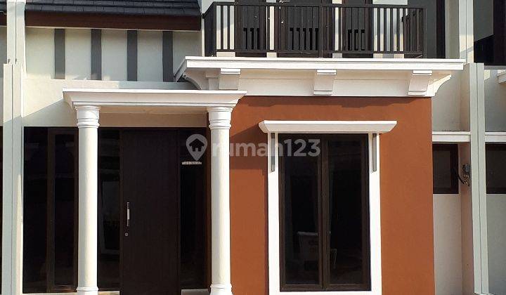 Rumah 2 lantai dengan konsep minimalis yg cantik 2