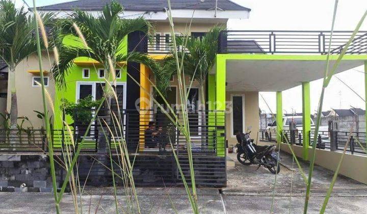 rumah asri di cluster full furnished 1