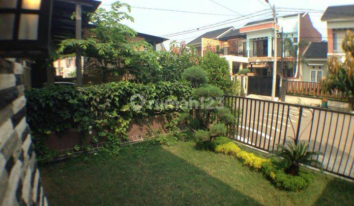 tampak depan rumah cantik murah di villa