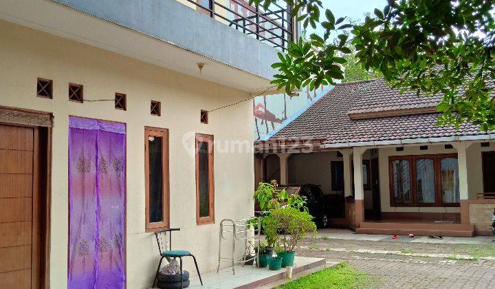 Rumah dan bangunan ada kos²an/kiosnya tanah luas dipinggir jalan raya Kranji Bekasi Kota 2