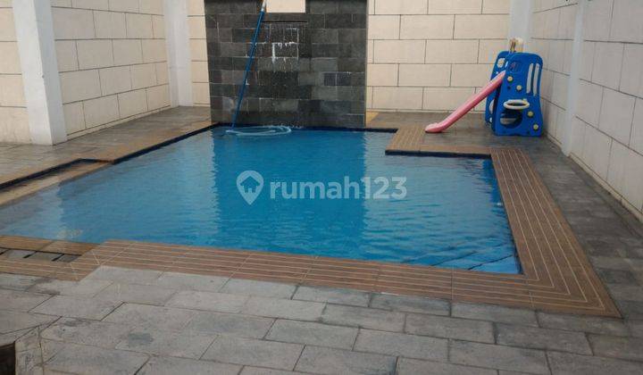 RUMAH MEWAH DALAM CLUSTER FASILITAS POOL DI LEBAK BULUS  2