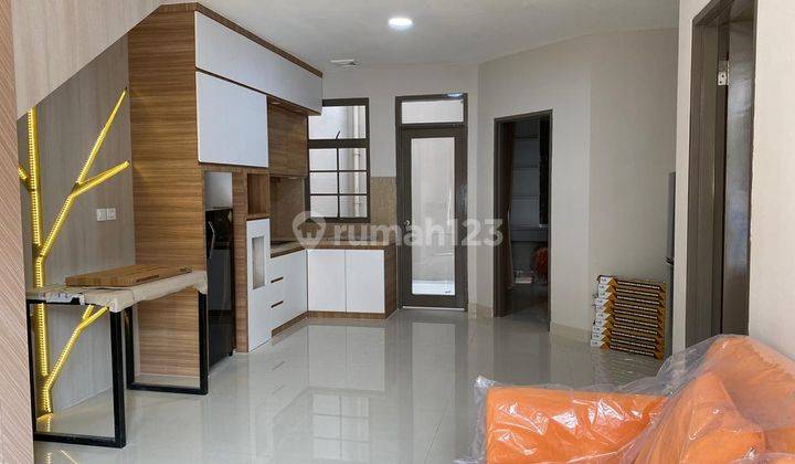 Rumah Town House Lantai Dasar Full Furnish 1