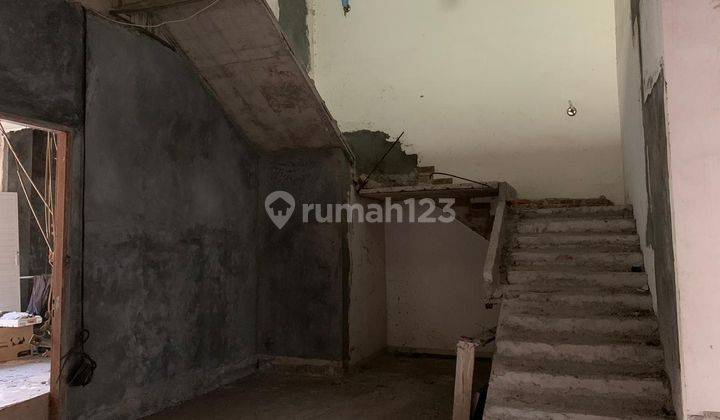 Rumah Pluit Putra Setengan Jadi 2