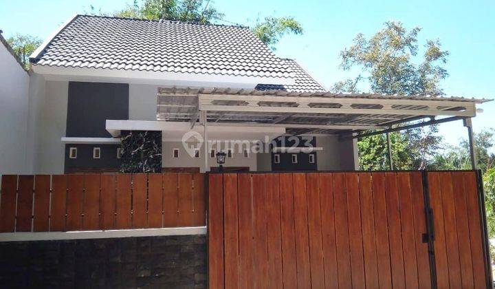 Rumah baru dekat jalan raya 1