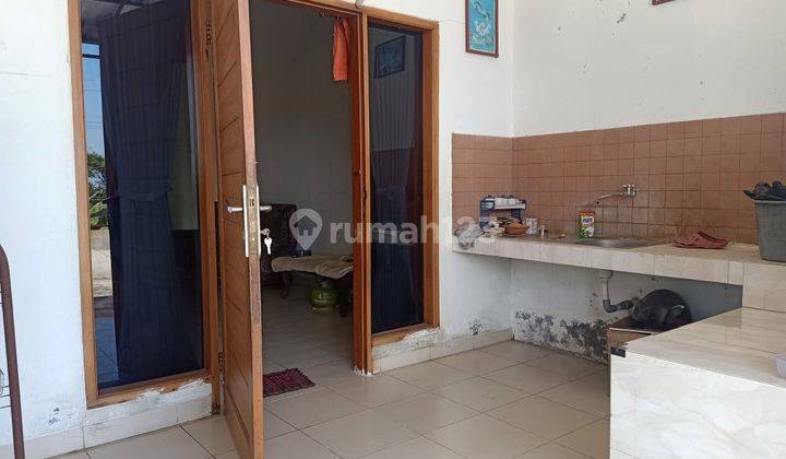 Rumah  di Jln Kolonel Masturi   2 rumah rendeng di hitung satu 1