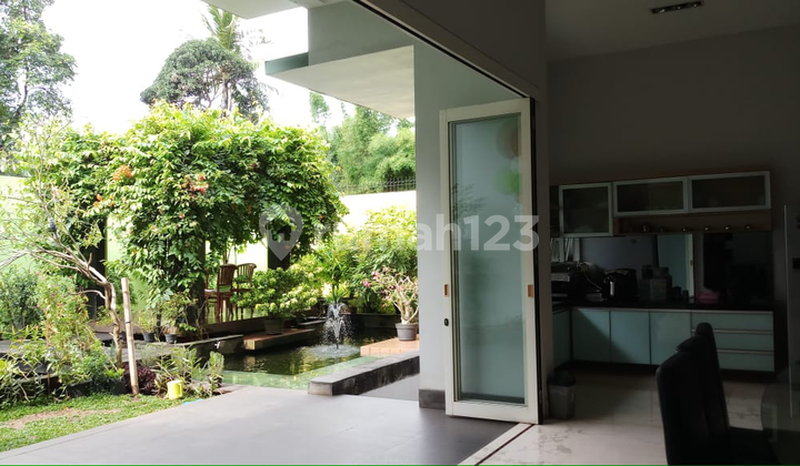 Luxury home with modern design in prime location by the golf course in BSD. 2