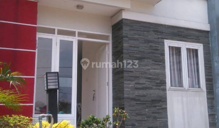 Rumah 2 Lantai Baru Unfurnished Sertifikat Hak Milik di De botanica, Bogor 1