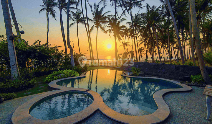 Absolute beachfront Villa with Sumatran style roof 1