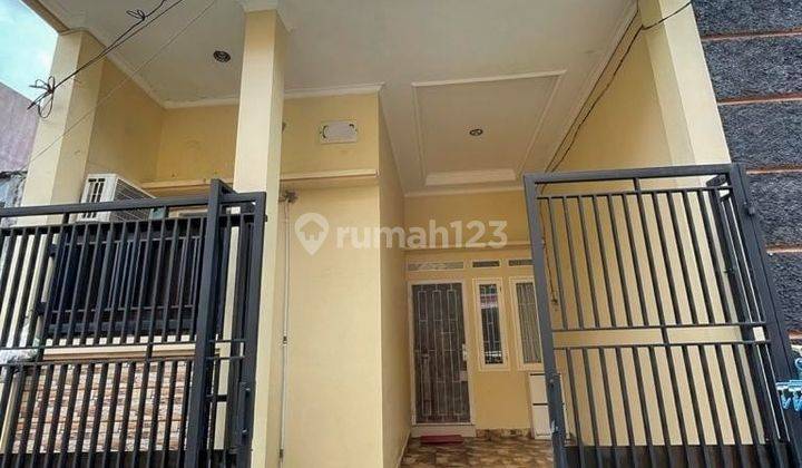 Rumah bagus dan siap huni di Jl. Mawar 7 Cipondoh - 0029-ERW 1