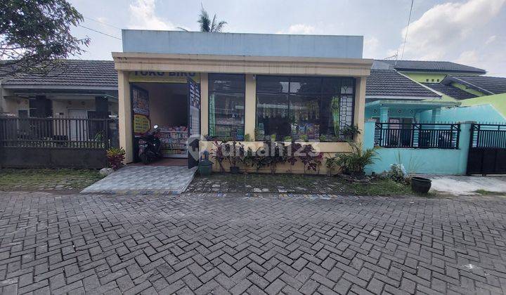 RUMAH DENGAN RUANGAN TOKO MASIH AKTIF DI JALAN UTAMA PERUMAHAN YANG NYAMAN 2