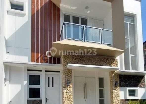 RUMAH MEWAH ELEGAN MODERN DALAM CLUSTER  TANAH TERLUAS HARGA MURAH 1