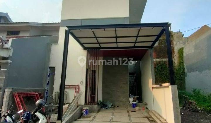 Rumah Baru SHM Design Mewah Lokasi Strategis Dekat SMP Al Hikmah Dan Masjid Agung Surabaya 1