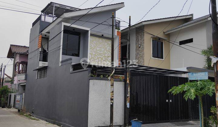 Rumah Cantik Terdiri Dari 2 Bangunan Di Pondok Pekayon Indah 1