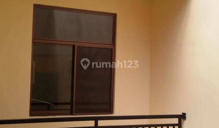 Rumah Taman semanan indah dekat sport club 2