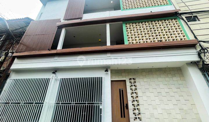 Dijual Rumah Kost Kosan 3,5 Lantai full penyewa luas 11x11,1 122m2 di Palmerah Jakarta Barat 1