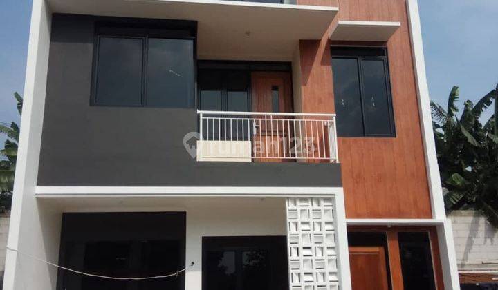 Rumah 2,5 Lantai Desain Milineal Dekat Jln Raya Bogor, Depok 1