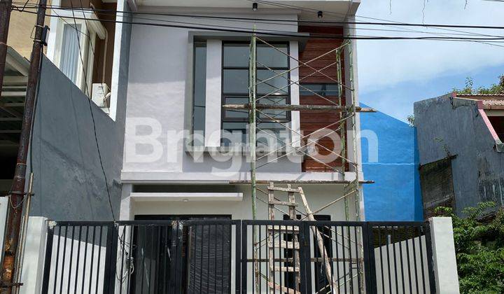 RUMAH NEW GRESS 2 LANTAI DAERAH WIGUNA GUNUNG ANYAR SURABAYA TIMUR 1