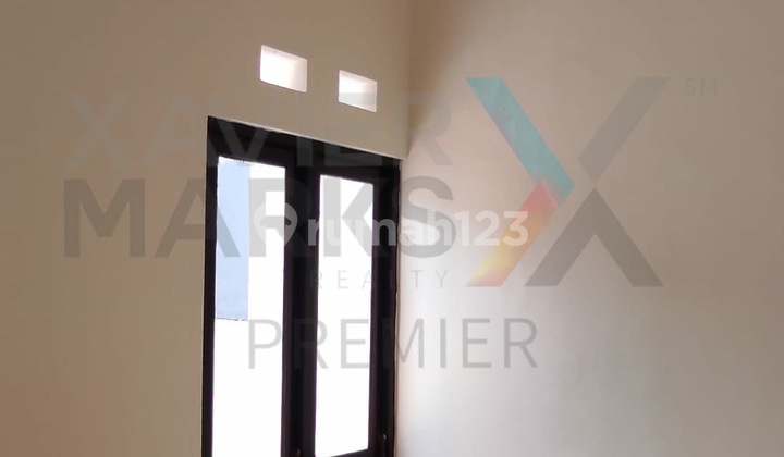 Rumah Modern Minimalis Selangkah dari Pintu Tol Singosari di Istana Cakalang Malang 2