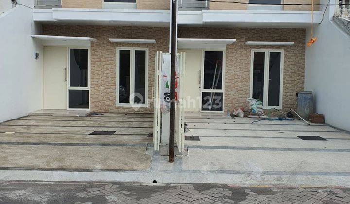 D031. Rumah Baru Minimalis Modern Lebak Indah Utara, Surabaya Utara 1