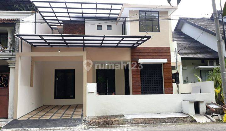 Rumah 2 Lantai Sudah Renovasi Sertifikat Hak Milik di Babatan Pratama, Surabaya 1