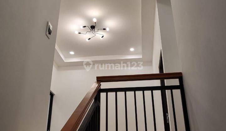 Regina Realty, Rumah Modern Griya Loka Bsd 1