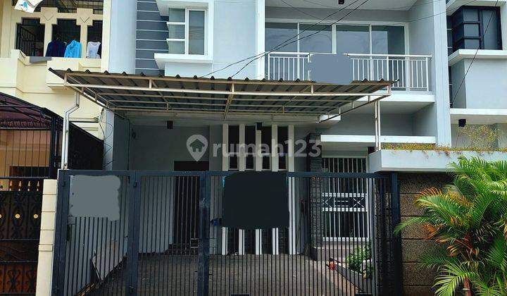 Rumah Baru Minimalis Cantik 8x18 di Green Garden Siap Huni 2