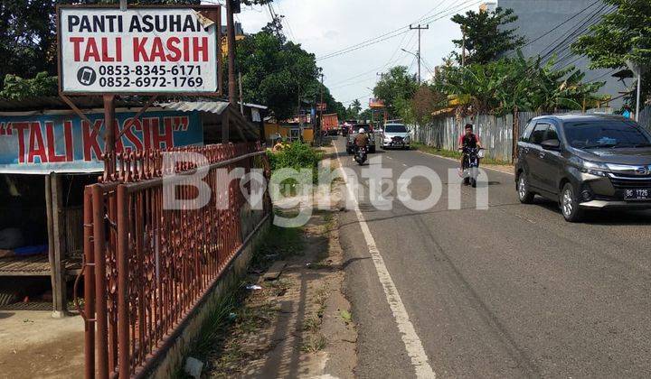 rumah pinggir jalan 2