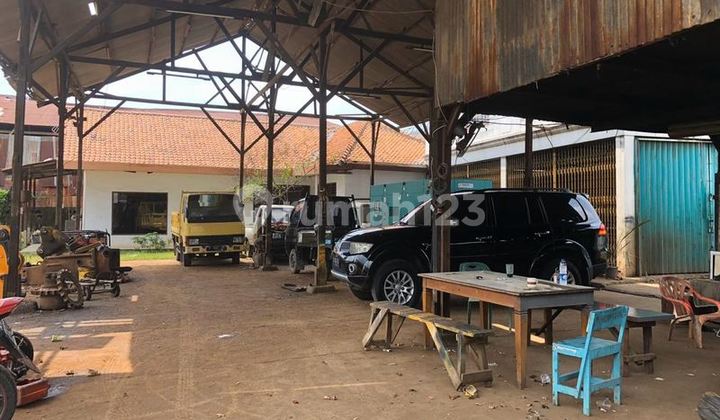 Tanah bonus gudang, jalan raya KH Ashari Cipondoh. 20002