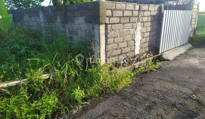 The land has a surrounding wall ready to build a rice field view 2