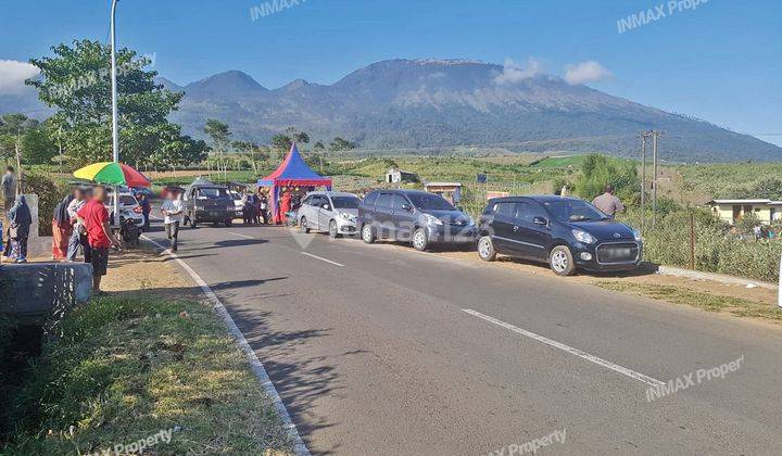 Tanah Murah Hook Di Poros Jalan Raya, Ada Kebun Apel View Pegunungan...Lokasi Strategis, Lingkungan Aman, Cocok Untuk Usaha Dan Investasi...Harga Nego Pemilik 1